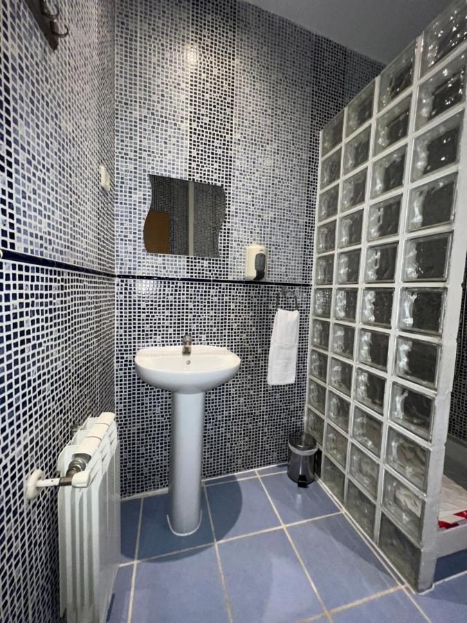 Habitación Triple con baño compartido